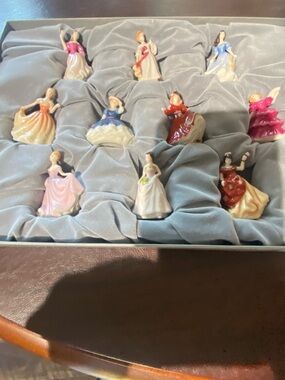 Royal Doulton Porcelain Figurine Set of 10 with box. 2.5 tall